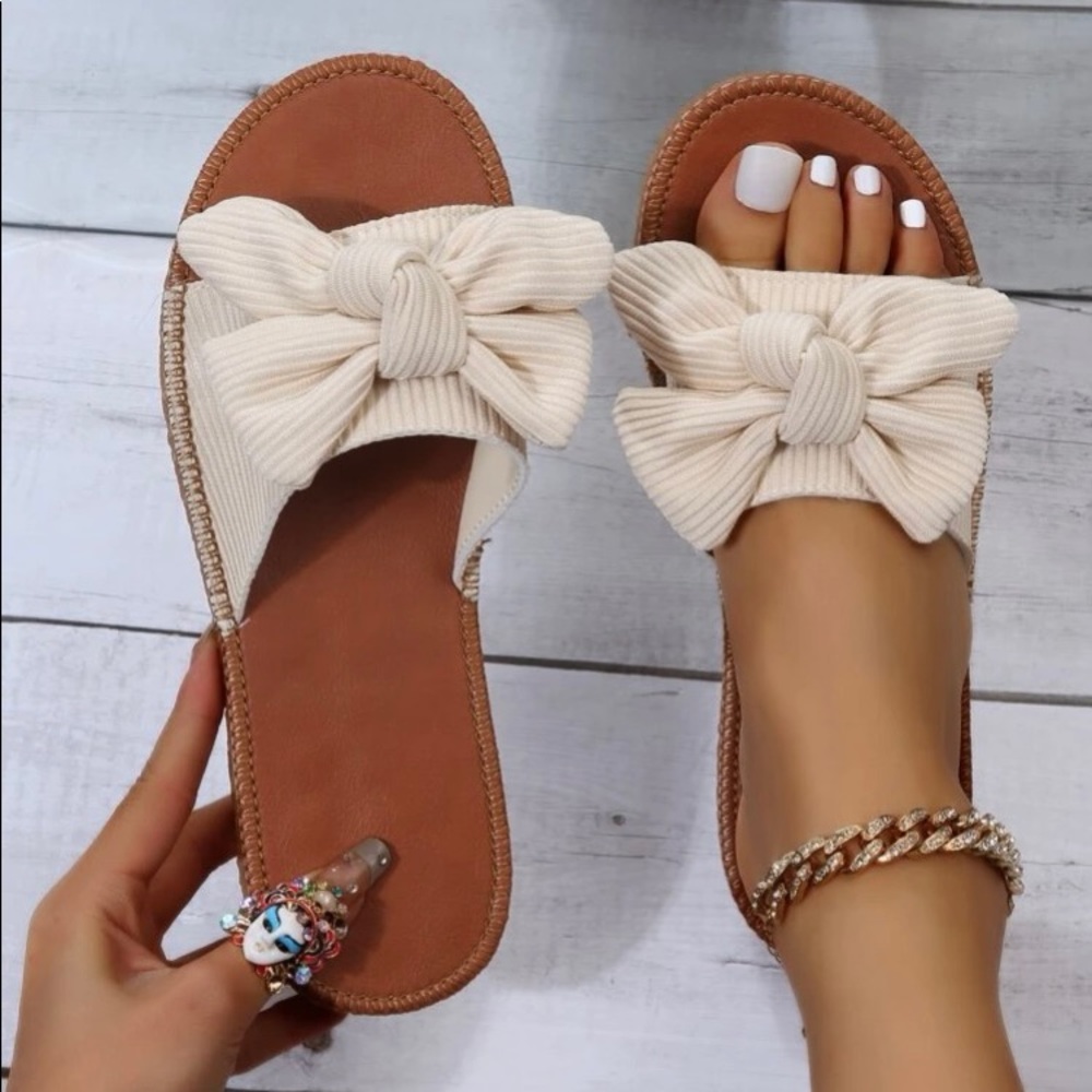 Brand new Bow decor Slide sandals.